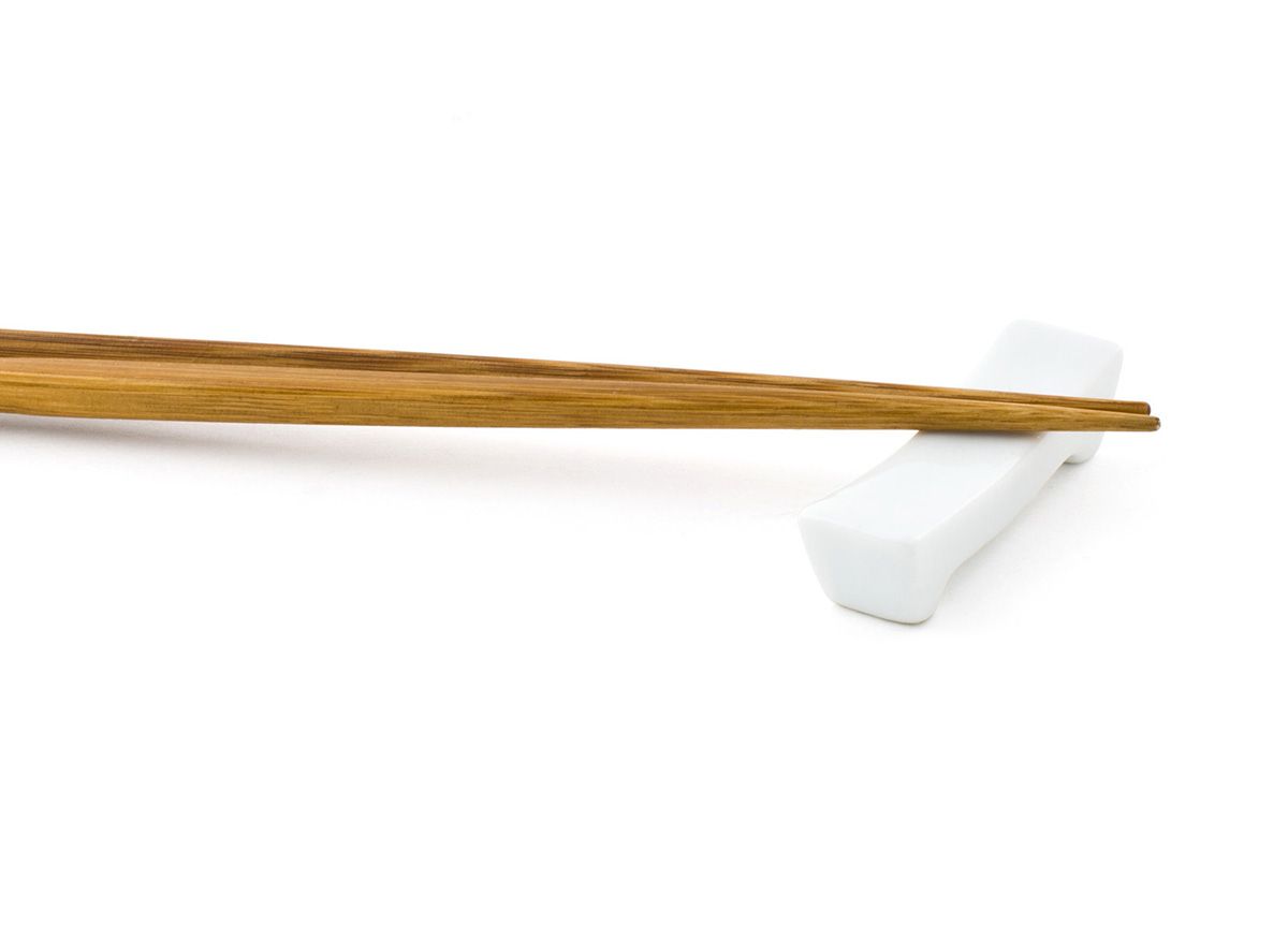 Apoyo clásico para palillos/cubertería